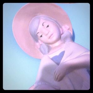 Huge Rex Valencia girl with hat holding a basket